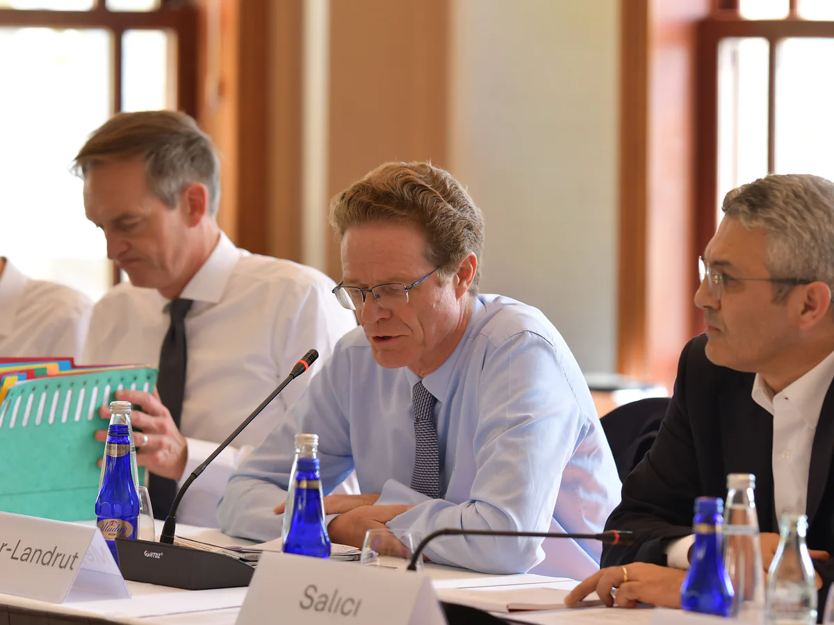 Business professionals speaking during a conference meeting in Istanbul