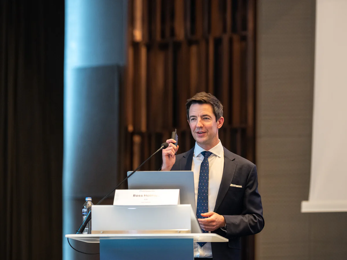 Conference keynote speaker photographed at an Istanbul business event